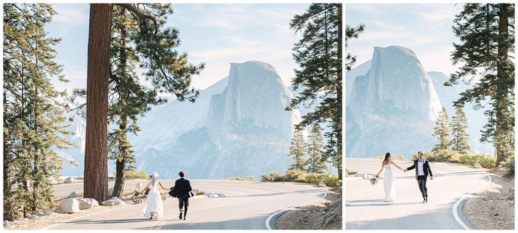 Bride and groom holding hands and walking along a winding road near Glacier Point, with Half Dome and tall pine trees in the background.