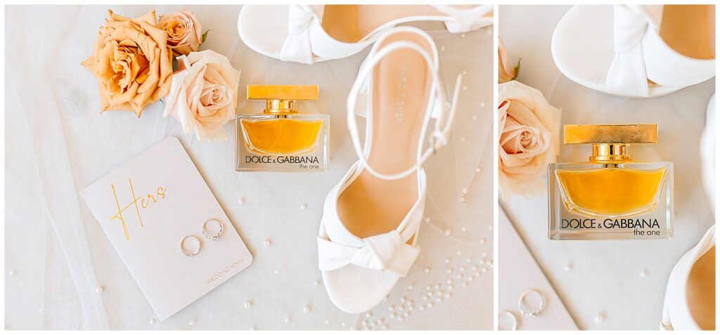 Brides details, white pearl heels, ivory vow book, dior perfume, wedding bands laid out over her pearl veil