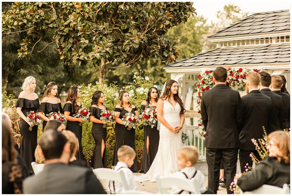 wedding ceremony at wonder valley ranch in sanger california with red roses