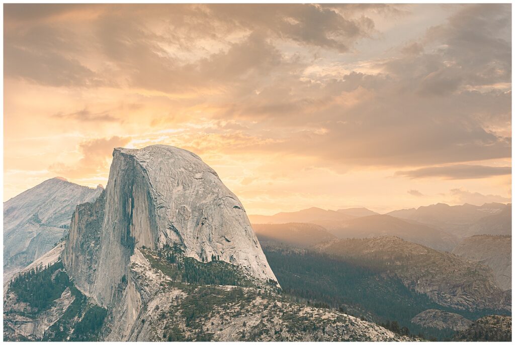 half dome at sunrise from Glacier Point during a storm