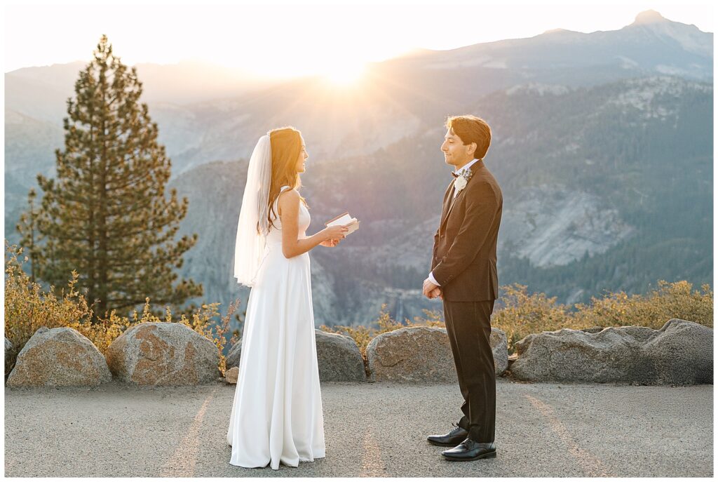 bride and groom saying their vows as the sunrises during their Yosemite Elopement