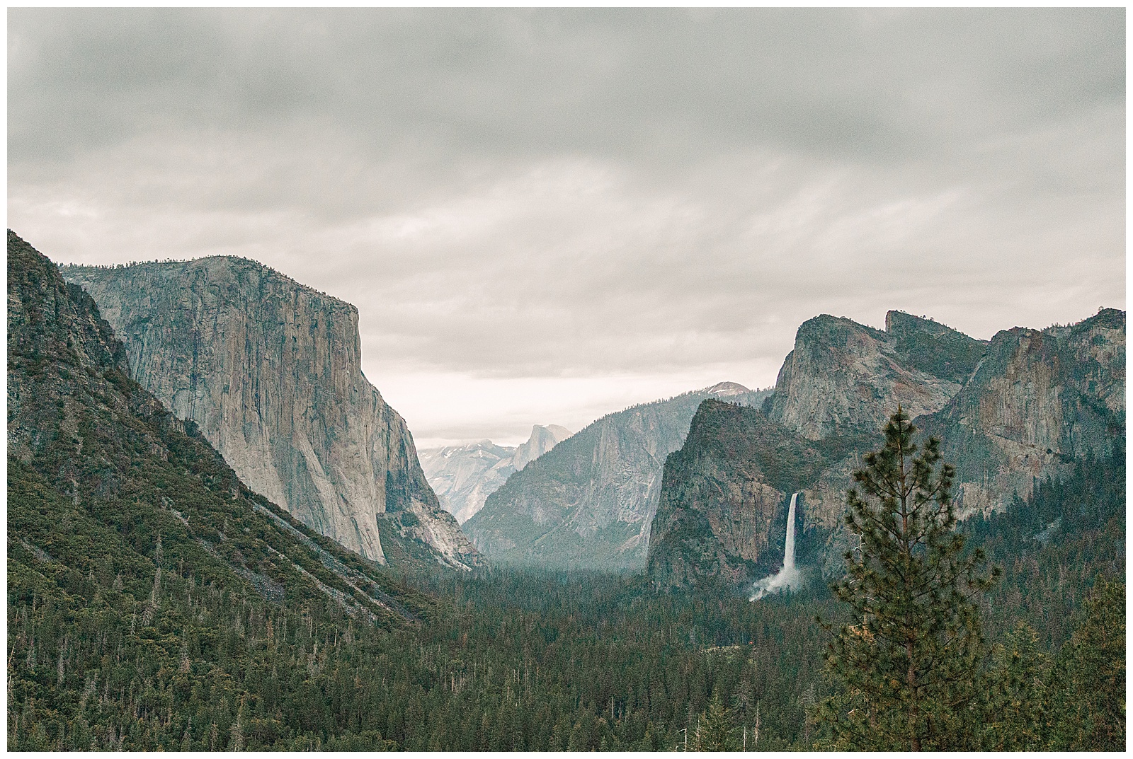 stormy morning at tunnelview in yosemite before sunrise during the summer